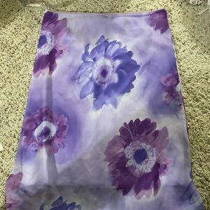 Cute purple skirt. Goes to about your knees. Size large